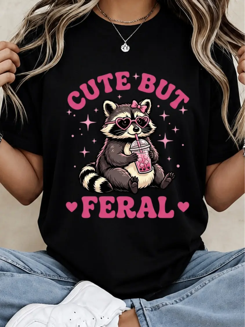 Women Cotton Graphic Tee Funny Cute But Feral Pink Raccoon Shirt For Iced Coffee Runs Casual Hangouts And Introvert Vibes