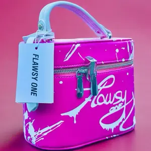 Flawsy One Handbag - Pink Handbag/Makeup Bag with Unique Design, Zipper Closure with lock & key, Handle and shoulder strap.