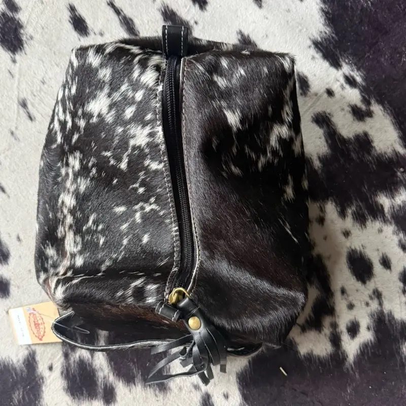 Black and white cowhide toiletry bag