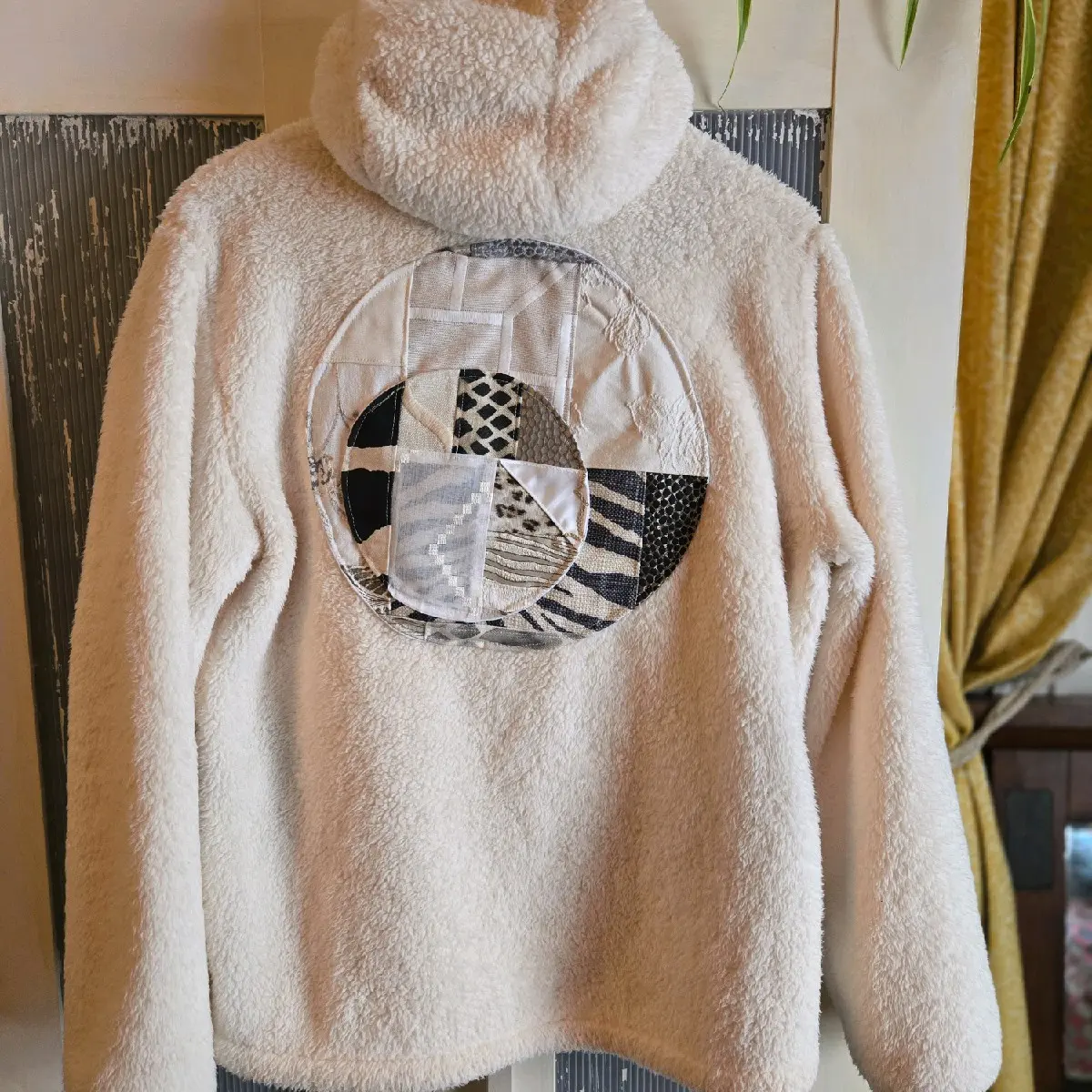 Up-cycled fleece hoodie with quilted accents