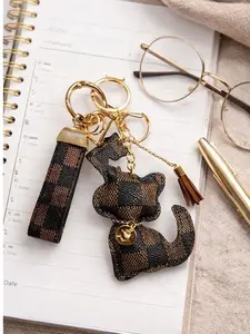 Chic Checkered Cat Keychain Bag Charm with Tassel and Gold Accent for Stylish Accessories