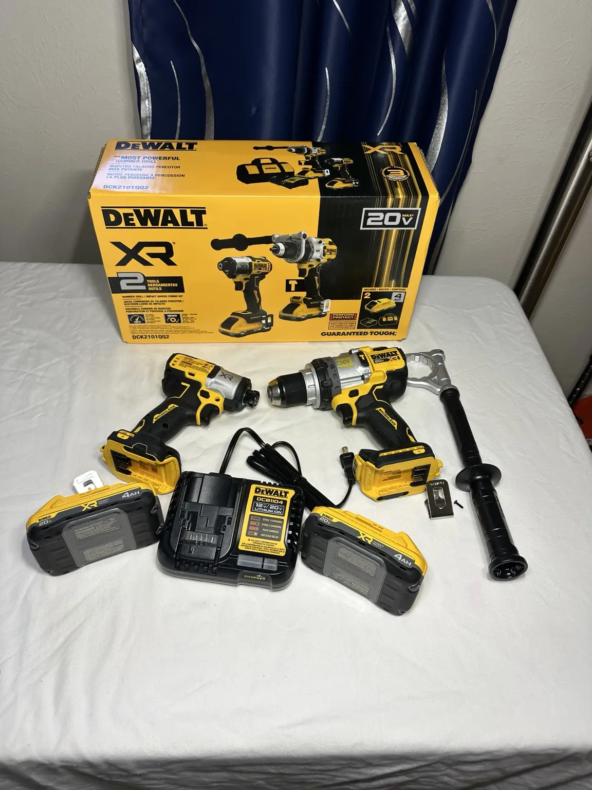 DEWALT 20V MAX XR Brushless 2-Tool Combo Kit. Designed for professionals, this kit includes a powerful hammer drill and impact driver, two 4.0Ah XR batteries, charger, and contractor bag.