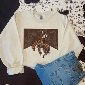 Checkered Bronc Desert Scene Crewneck Sweatshirt, western clothing, western tops, western outfits women, western cowgirl stuff, punchy western wear, country girl stuff clothing clothes, women's graphic tees, sweatshirts for women, rodeo outfits