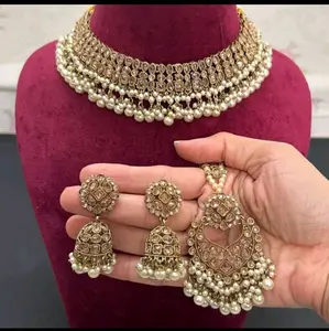 Premium antique gold reverse AD necklace with jhumka and maang tikka set.