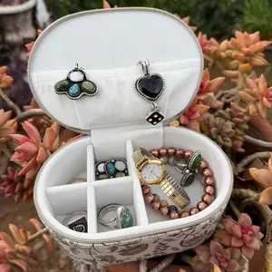 Travel jewelry floral design case