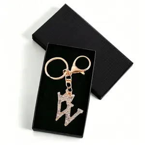 Customizable Gold-Colored Initial Keychain, A-Z Metallic Letter Charm with Sparkling Crystal Crown, Gold-Colored Charm Keychain for Handbag, Backpack, Birthday Gift, Customizable Keychains, Gold-Colored Charm Keychains