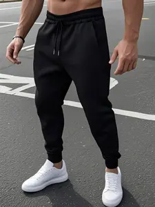 Black Slim-Fit Joggers, Tapered Sweatpants, Fitness Trousers, High-Stretch Fabric, Streetwear Essential For Gym/Casual Outfits, Drawstring Waist + Cuffed Ankles, Men’s Workout/Casual Pants, Street Style & Comfortable Daily Wear