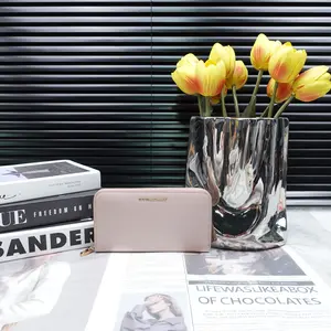 Pre-owned BURBERRY Calfskin Small Leather Goods Pink Long Wallet T10319321