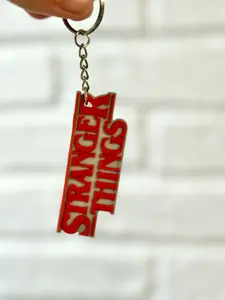 Glow-in-the-Dark Stranger Retro Horror Logo Keychain - Vintage Horror-Inspired Neon Glow Keychain for Bags Backpacks Keys & Décor