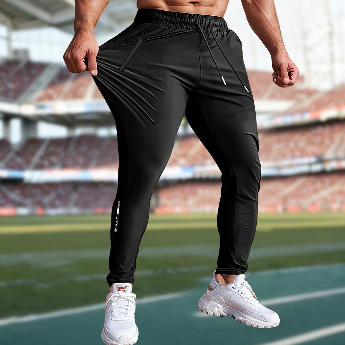 Men's lightweight ice silk fiber fabric joggers with quick-dry elastic waistband and hidden zipper design, breathable and comfortable straight-leg pants, suitable for casual wear, outdoor activities, and party style.