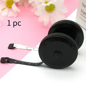 1.5M Mini round black frosted automatic shrink soft leather tape measure - portable mini tape measure for measuring clothing length and circumference.