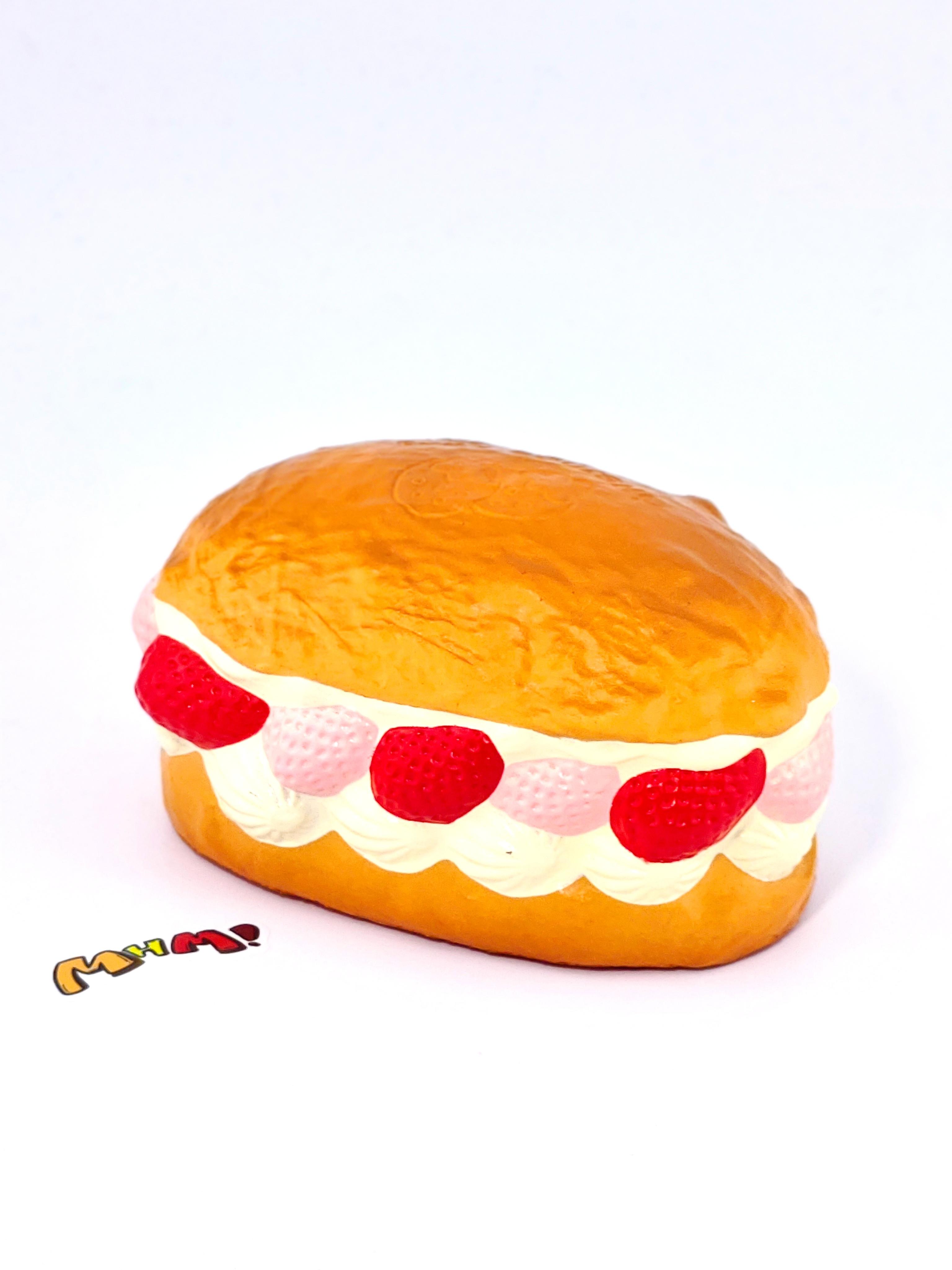 MHM Squishy Pink Strawberry White Cream Bread scented stress relief toy features a sticky, wet-soft, slow-bounce pastry texture for tactile fun
