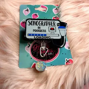 Sonographer in Progress Badge Reel with Fun Loading Design and Glitter Charm for Medical Professionals