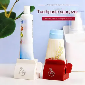 Rolling Toothpaste Tube Clip (2PCS) - No-Waste Squeezer Stand for Toothpaste & Creams (Red+White) Toothbrush Organizer Set