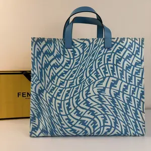 Pre-owned FENDI Blue Zebra Print Tote Bag with Blue Handles and White Background