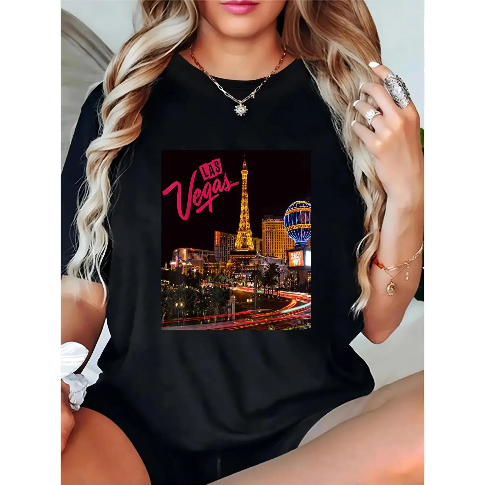 Women's Las Vegas Night Cityscape Graphic T-Shirt - Eiffel Tower, Hot Air Balloon, Neon Lights Print | Casual Black Tee for Travel, Nightlife, Trendy Vegas Outings 100% Cotton T-shirt