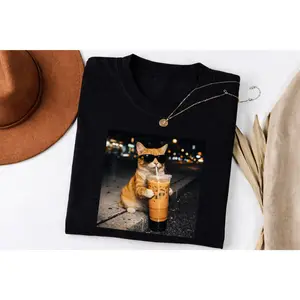 Urban Night Graphic Tee with Cat Drinking Iced Coffee – Casual Short Sleeve T-Shirt for Coffee Lovers