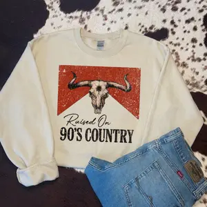 Raised on 90s Country Western Bull Skull Sweatshirt, western clothing, western tops, punchy western wear, western outfits for women, western cowgirl stuff, country girl stuff clothing, graphic tees women, sweatshirts for women, western for women