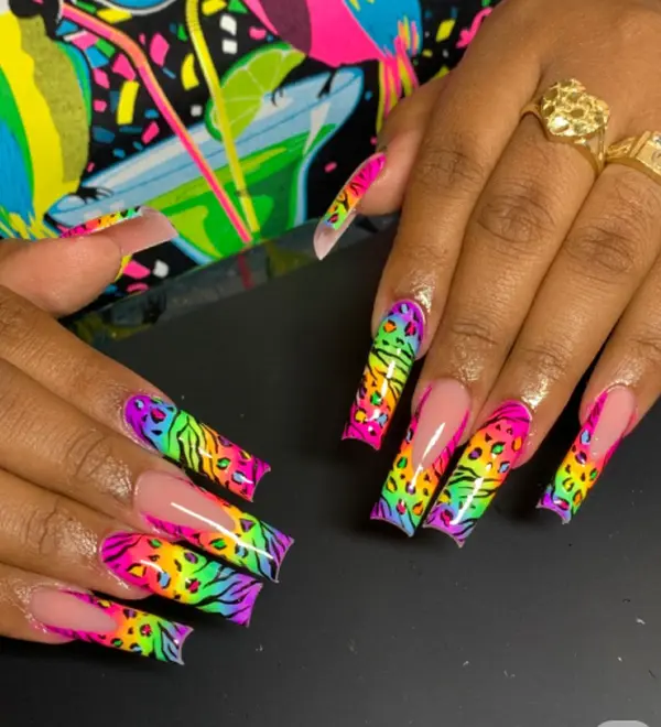 Neon rainbow animal print nails with fierce vibes – bold, colorful, and perfect for standing out with wild glam energy!