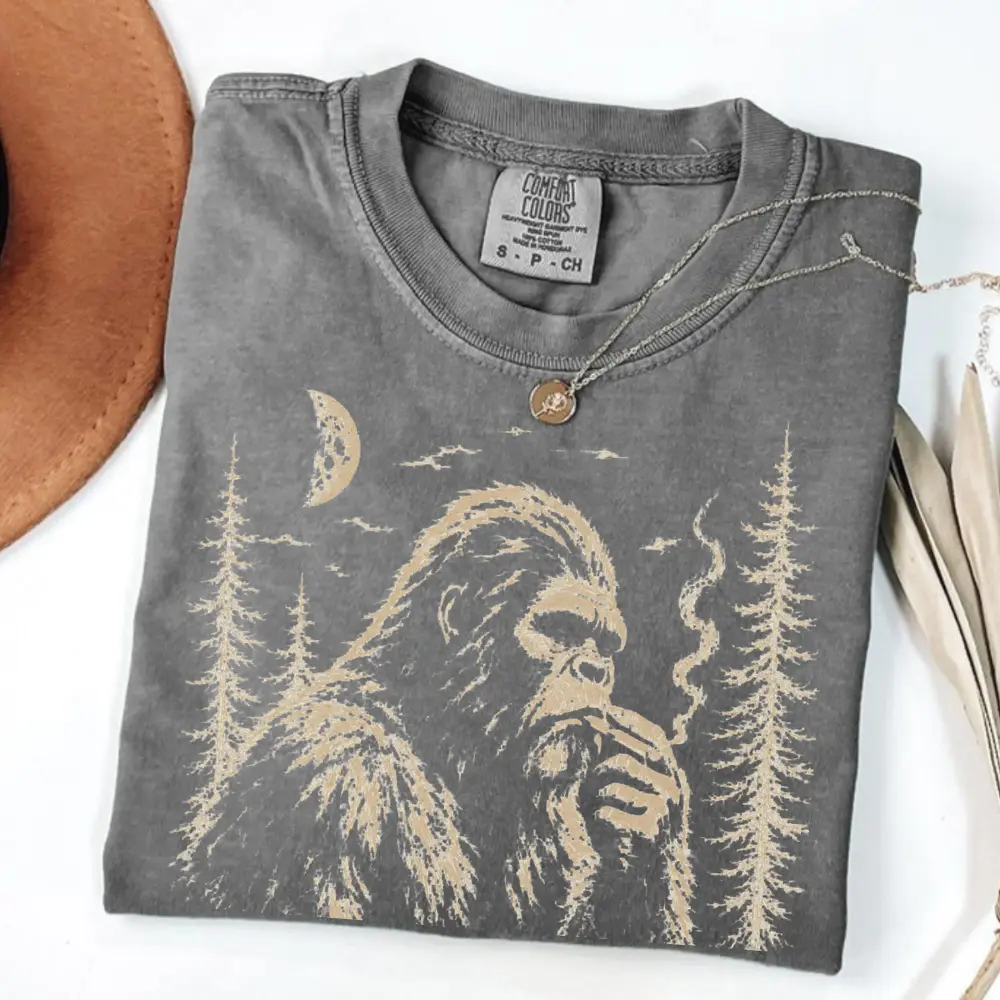 Comfort Colors Bigfoot Smoking Cigarette Shirt, Sasquatch Smoker Tee, Funny Bigfoot TShirt, Cryptid Lover Gift, Woodland Sasquatch Graphic Tee