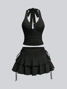 Women's Summer Contoured Cut-Out Pleated Bustier Cropped Top & Tiered Ruffle Skirt Set:Detachable Metal Clasp Halter Strap w/ Crisscross Back & Adjustable Side-Tie Chic Solid Hue Beach Cover-Up Ensemble-Architectural Elegance for Coastal Adventures