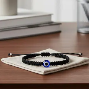 Black Evil Eye Bracelet - Black Beads with Blue Center Stone, Adjustable Cord