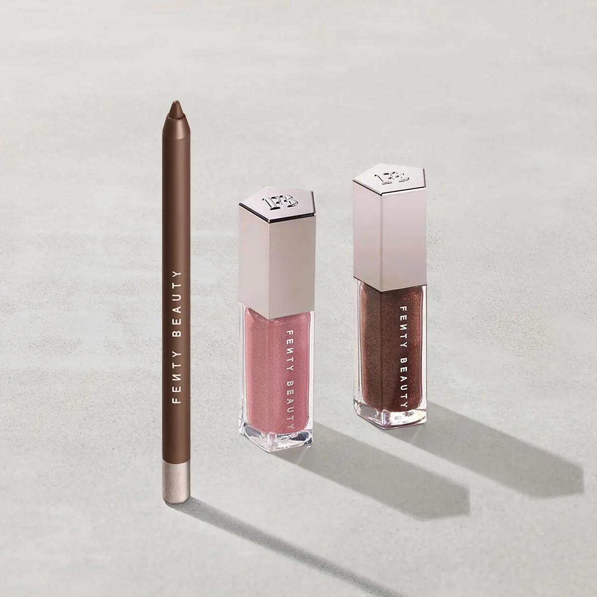 Fenty Beauty Swirled Lip Essentials: Gloss Bomb Lip Gloss + Trace’d Out Lip Liner Fenty Beauty Swirled Lip Essentials: Gloss Bomb Lip Gloss + Trace’d Out Lip Liner