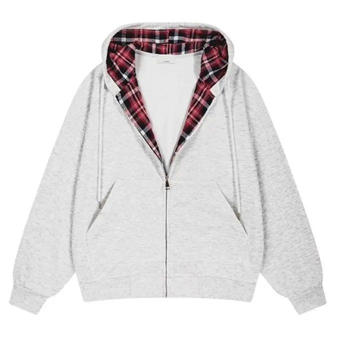 Light heather gray zip up hoodie with red plaid lined hood, front kangaroo pockets, elastic cuffs and hem, relaxed oversized fit, casual layered outerwear for everyday street outfits