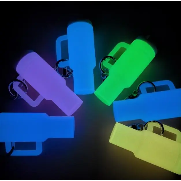 70pcs Luminous Mini Keychains Stickers Set Including Random Luminous Keychains and Cartoon Stickers Can Used To Be Gift or Lipstick and Coin Storage Key Accessories
