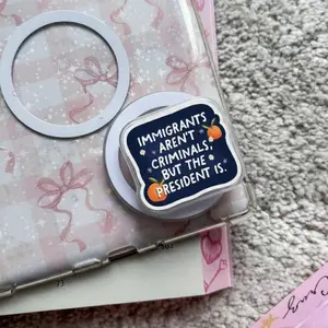 mmigrants Aren't Criminals But The President Bookish Grip, Anti ICE Griptok pop socket sticky Wireless Foldable Mag-Safe Holder Mount
