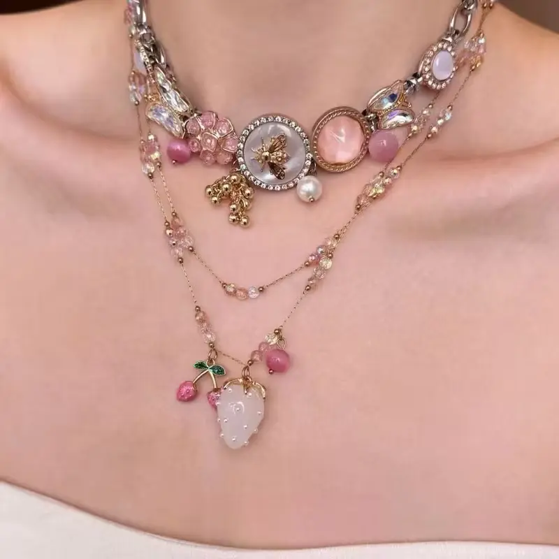 A Single Piece Featuring a Pink Cherry Blossom And Strawberry Necklace, a Chic And Graceful Clavicle Chain Suitable for Layering
