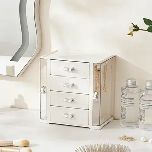 UFORU 4-Tier, High-Capacity Jewelry Box with four drawers; this organizer is made just for women and has separate sections for rings, earrings, necklaces, and bracelets.