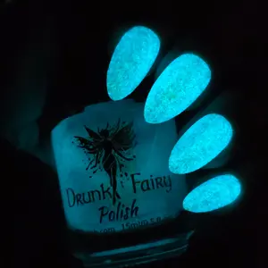 Glowing Crystal Galaxy GlowInTheDark Nail Polish by Drunk Fairy Polish | An Irregular Aurora Flaky Topper in Our Blue Moon Glow-In-The-Dark Base That Goes From Purple to Blue to Red to Gold and Green at the Extremes