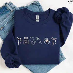 Minimalist Nurse Icons Gildan T-Shirts, Crewneck Sweatshirts & Pullover Hoodie, Cute Medical Crewneck for Hospital Staff, RN Appreciation Gift, Nursing School Graduation Pullover for Her FGRE