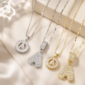 Light Luxury Sparkling Step-Cut Diamond Initial Necklace available in two designs: circular ring and thick version, a popular accessory in gold and silver two-tone finishes name quality