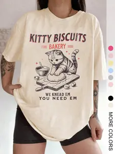 Unisex Funny Cat Bakery Graphic Casual T-Shirt Streetwear with "We Knead Em You Need Em" Slogan, Kitty Biscuits Design for Pet Lovers and Humor Fashion, Clothes