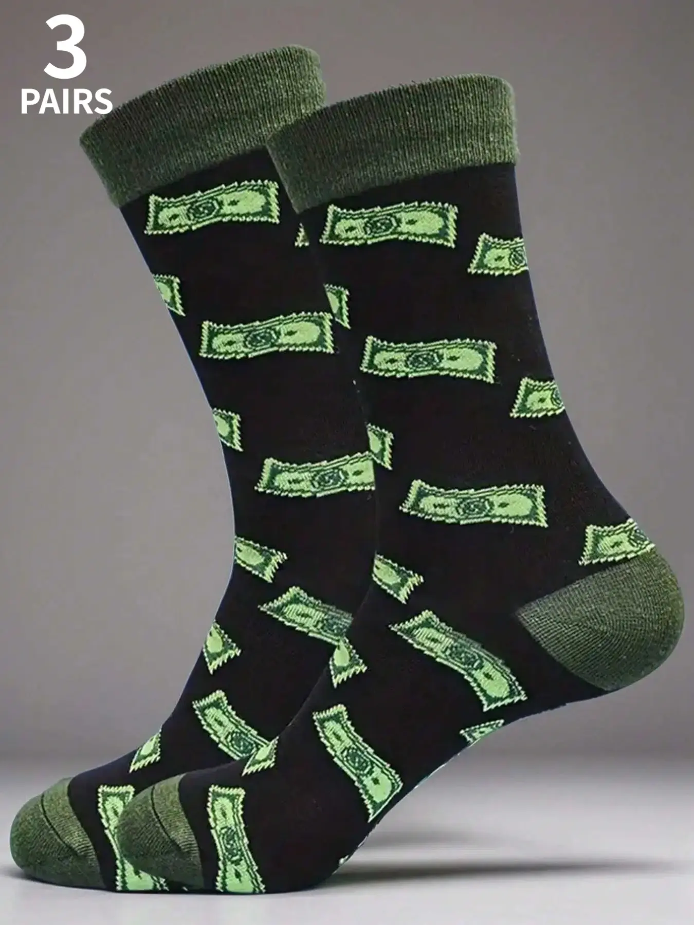 3 pairs of men's creative mid-calf socks with dollar patterns, featuring a black background and green coin design. They are full of fun, suitable for daily wear and gifting, and can be used in all seasons and various festivals, making them an ideal choice