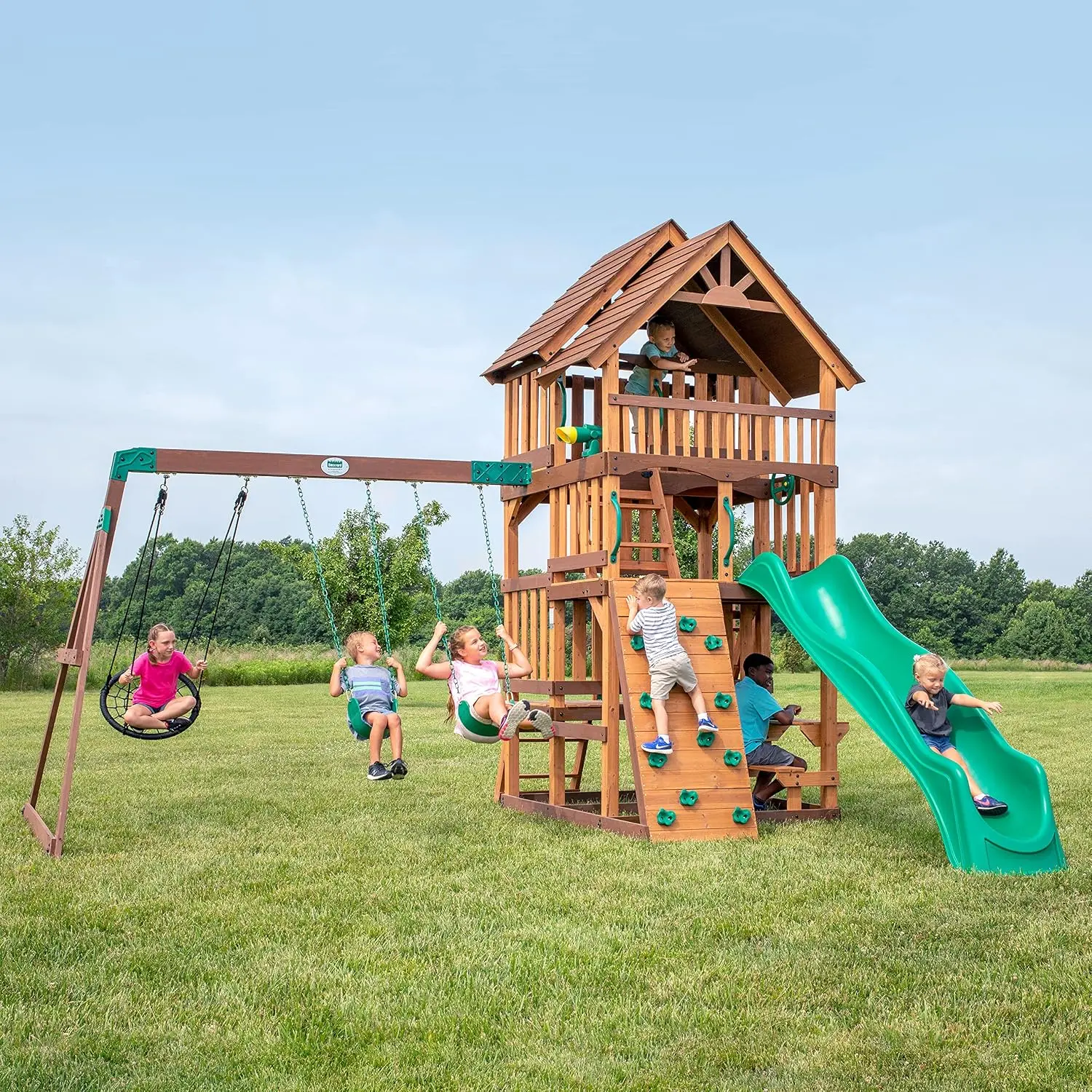 URGEWBackyard Discovery Highlander Cedar Wood Swing Set with Wave Slide, Three-Story Clubhouse, Rock Wall, Picnic Table, Belt Swings, Web Swing, Sandbox, Three Ladders, Toy Accessories, Outdoor Playset