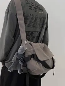 Stylish Plain Canvas Adjustable Crossbody Shoulder Bag for Men with Cartoon Charm Large Capacity Shoulder Bag Perfect for Work and School Commute