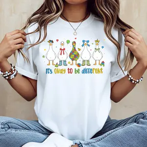 Duck Characters With Colorful Outfits And Its Okay To Be Different Print Tshirt White Casual Round Neck Short Sleeve Tee For Women Daily Wear And Gift