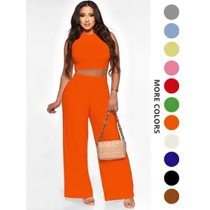 Women’s two-piece solid-color top set featuring a casual round-neck crop top and wide-leg pants—summer everyday wear for women GARMENTARY
