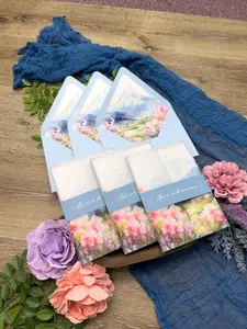 Spring Wildflower Colorado Mountain Wedding Invitation suite, with vellum jacket and envelope liner