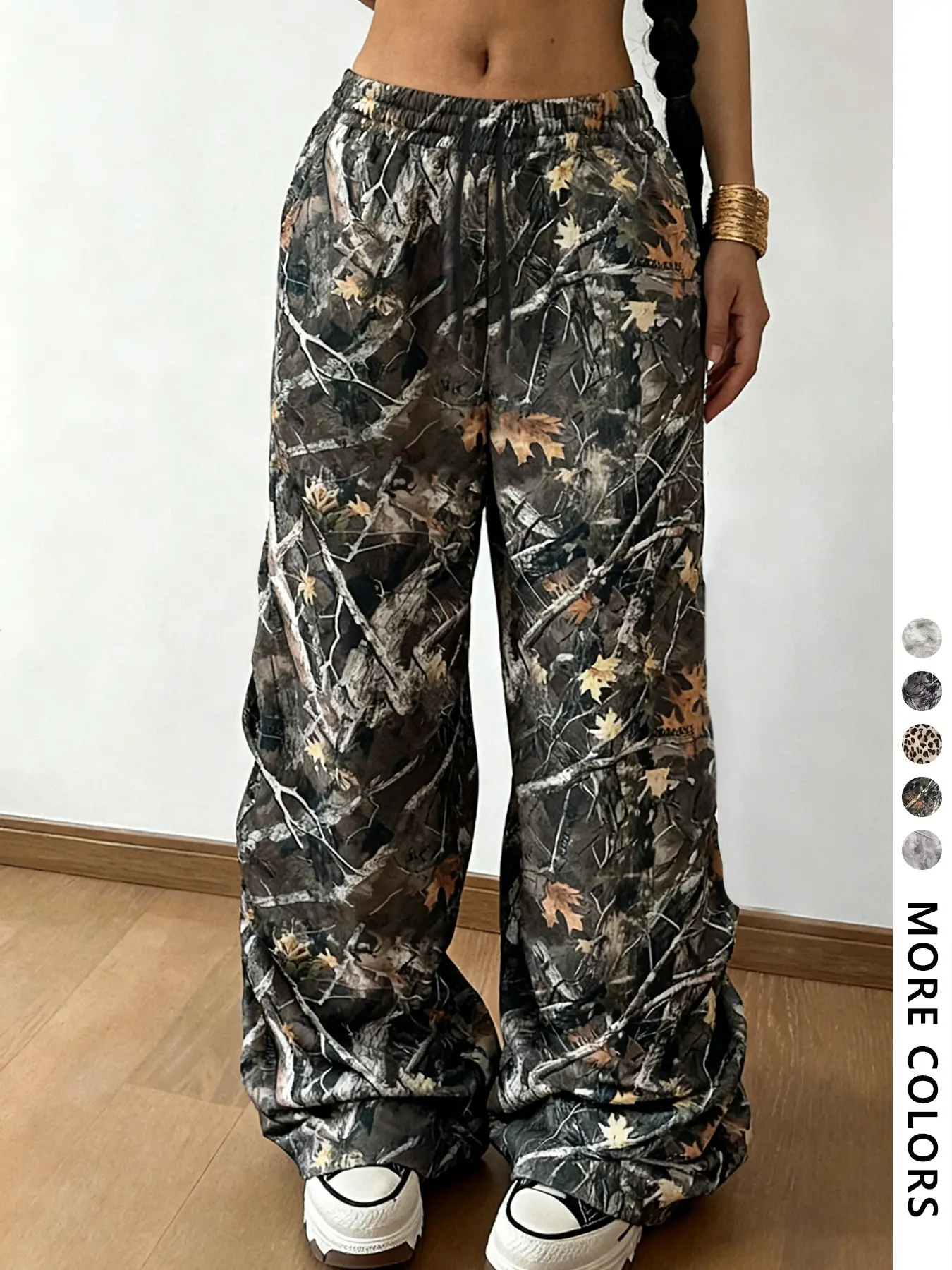 Viral Y2K Vibes!  Printed Pants—Womenswear, Soft, Baggy, & Trendy Camouflage/Leopard Prints. Perfect for Street Style & Cozy Days. Adjustable Drawstring Waist, Flowy Silhouette. Grab Yours Now! #TikTokFashion #OOTD #BaggyPants #TrendyTrousers