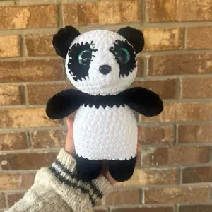 Handmade crochet blue eyed panda plushie