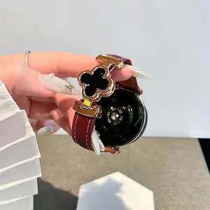 Magnetic four-leaf clover leather strap