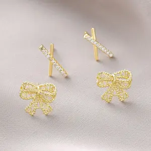 springtok Golden hollow lace bow/X-shaped zircon earrings for pierced ears, daily wear gifts for women