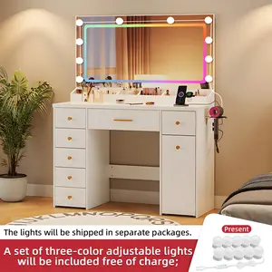 Vanity with a large mirror and colorful LED lighting (includes a set of three-color lights) 7 drawers a hair dryer holder, and a two-tier sliding cabinet on wheels. Power outlet. This bedroom dressing table makes the perfect gift