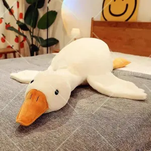 Cute Big White Goose Plush Pillow Toy! Large and irresistibly huggable, it's a favorite for both kids and adults. Suitable for all beds, offering coziness whether you cuddle or clamp it. A practical and sweet sleep companion. Gift Cozy