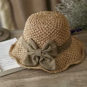 Elegant French-style women's straw hat - bucket hat with vintage ruffles and bow, lightweight, breathable, and foldable