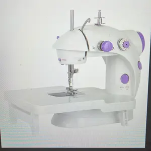 Portable desktop sewing machine with extension table